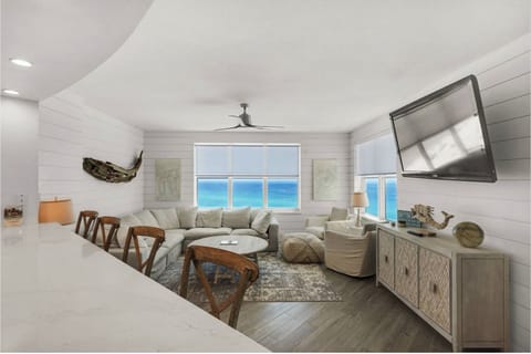 Sink into plush seating while ocean breezes flow through your windows. Your coastal retreat features stunning sea views and cozy furnishings for ultimate relaxation.