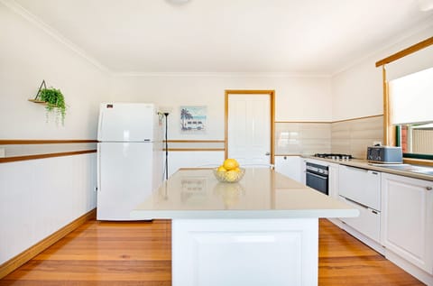 Full size refrigerator in kitchen