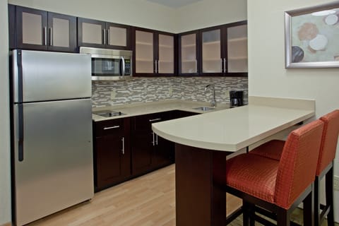 Curb your appetite by cooking a meal in your kitchen.