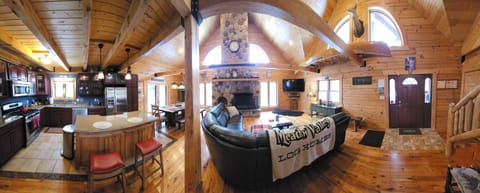 Panoramic view of kitchen and living space