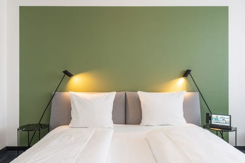 Hypo-allergenic bedding, in-room safe, desk, laptop workspace