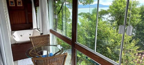 Triple Room | Living area | Flat-screen TV
