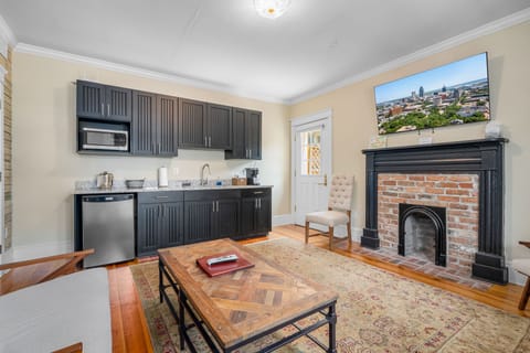 Luxury Studio Suite, 2 Bedrooms, Balcony | Living area | 40-inch flat-screen TV with satellite channels, TV