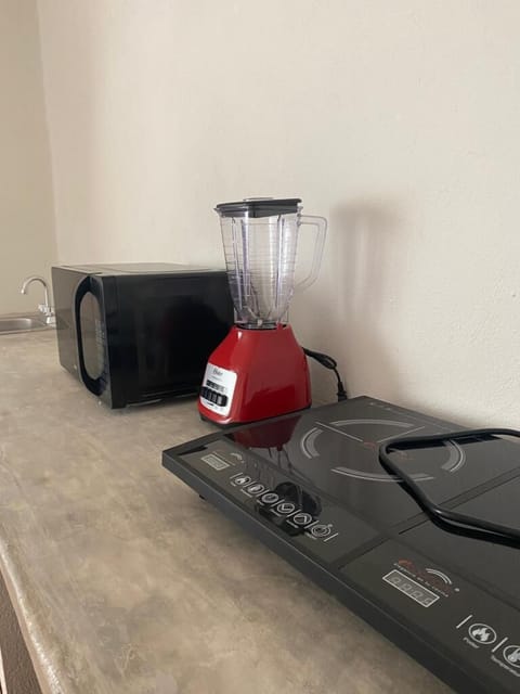 Superior Bungalow, Pool View | Private kitchenette | Shared fridge