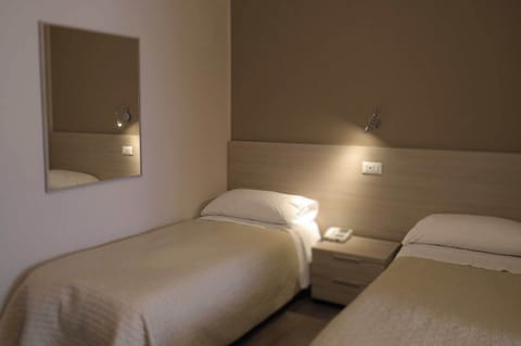 Twin Room | Minibar, desk, iron/ironing board, free WiFi