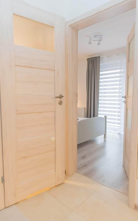 Deluxe Apartment | Living area | 42-inch LED TV with cable channels, TV
