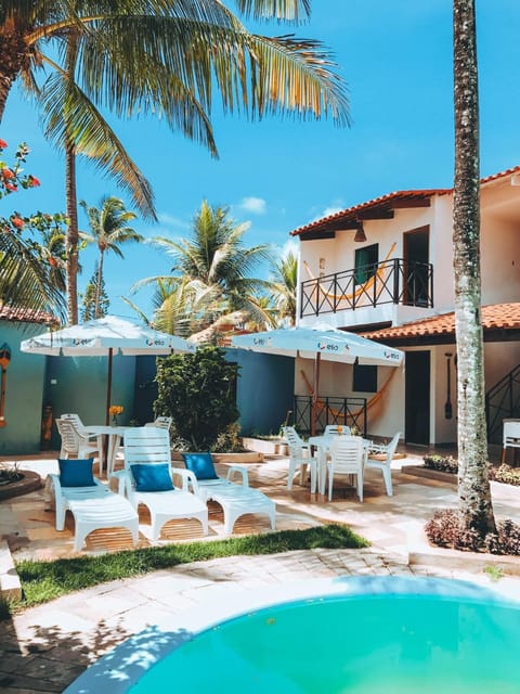 Outdoor pool, open 8:00 AM to 8:00 PM, pool umbrellas, sun loungers