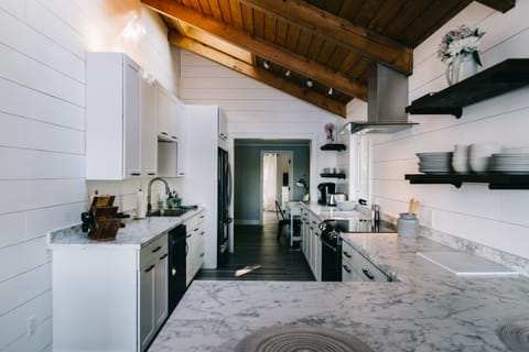 Spacious kitchen with plenty of prep space, oven, microwave, dishwasher & more.