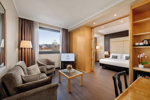 Suite | Living area | 26-inch LCD TV with satellite channels, TV