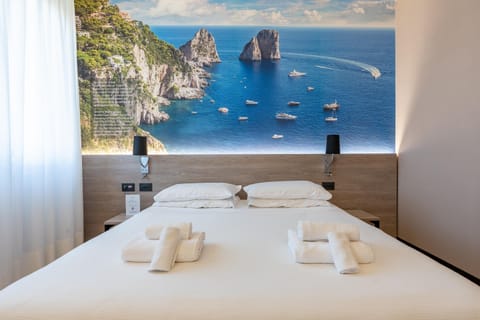 Superior Quadruple Room | Premium bedding, down comforters, Select Comfort beds, in-room safe