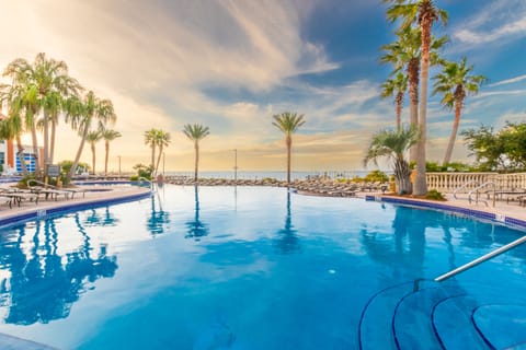 Indoor pool, 3 outdoor pools, open 9:00 AM to 10:00 PM, sun loungers