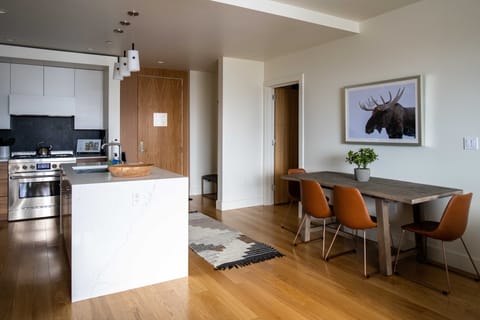 Living room looking into Kitchen and Dining area