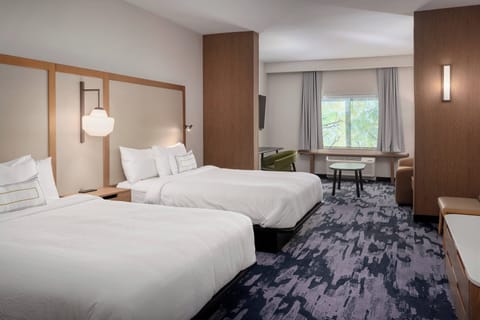 Suite, Multiple Beds | Desk, laptop workspace, blackout drapes, iron/ironing board