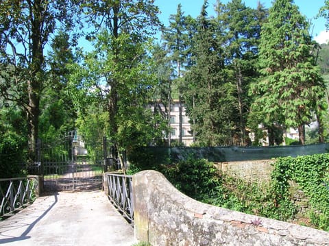 Small bridge with gated entrance to the Villa (back middle) 