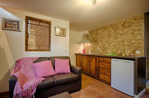 Apartment, 1 Bedroom | Living area | LCD TV