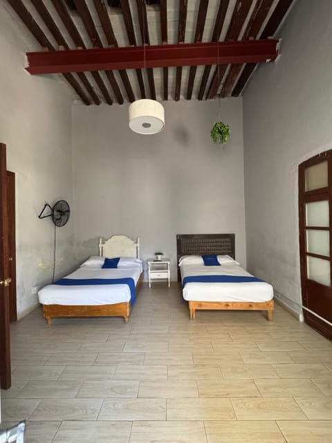 Standard Quadruple Room, 2 Double Beds | Free WiFi, bed sheets