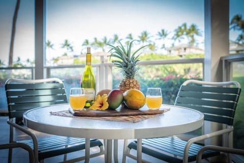 Dine al fresco on the furnished lanai overlooking the lush greens
