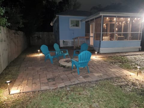 Fire pit and lighted screened deck