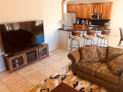 75" flat screen TV in the living room