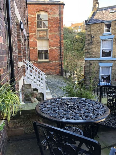 Private patio overlooking the cobbled street