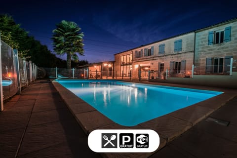 Seasonal outdoor pool, open 11:00 AM to 9:00 PM, pool umbrellas