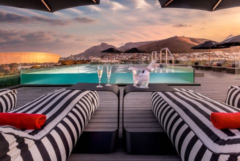 Outdoor pool, pool umbrellas, sun loungers