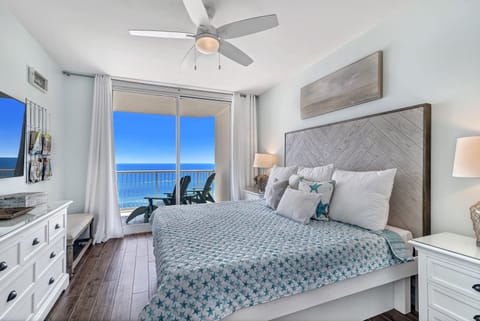This spacious Primary bedroom offers a comfortable king-size bed and a private balcony overlooking the mesmerizing ocean.