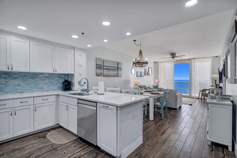 Bright and airy kitchen with ample counter space and modern amenities, creating an inviting space for cooking and gathering.