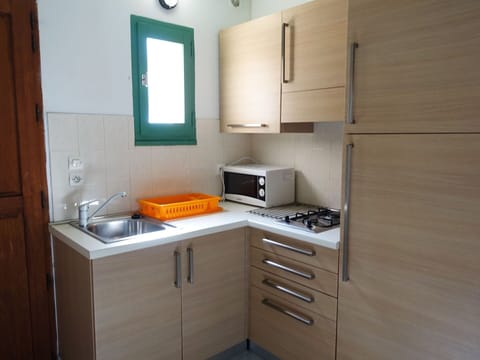 Cabinetry, Countertop, Furniture, Kitchen Sink, Building, Sink, Drawer, Kitchen Stove, Kitchen Appliance, Kitchen