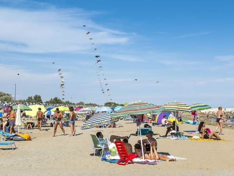 Cloud, Sky, Natural Environment, Beach, Leisure, Biome, Shade, Fun