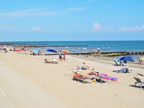 Water, Sky, Cloud, Ecoregion, Beach, Shade, Umbrella, Coastal And Oceanic Landforms