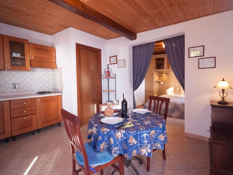Table, Cabinetry, Furniture, Building, Property, Chair, Wood, Picture Frame, Lighting, Interior Design
