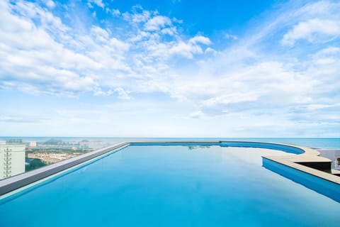 Seasonal outdoor pool, open 6:00 AM to 7:00 PM, sun loungers