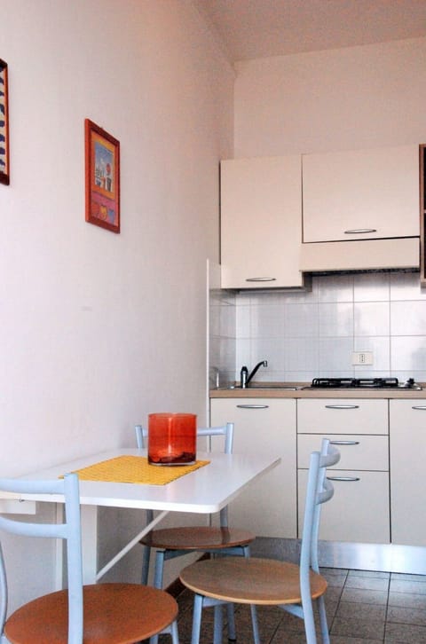 Room, Furniture, Orange, Property, Interior Design, Building, Table, House, Yellow, Kitchen