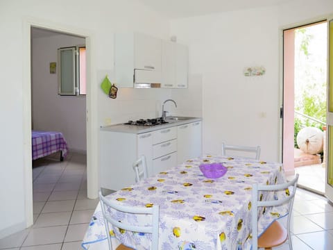 Furniture, Room, Property, Floor, Interior Design, Wall, Yellow, Purple, Building, Table