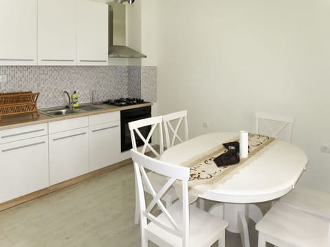 Room, Property, White, Furniture, Countertop, Floor, Kitchen, Interior Design, Tile, House