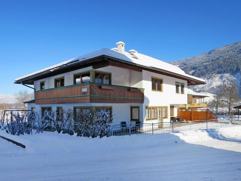 Sky, Building, Snow, Property, Window, House, Slope, Tree, Mountain, Siding