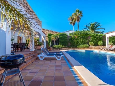 Water, Sky, Plant, Property, Blue, Azure, Swimming Pool, Tree, Outdoor Furniture, Arecales