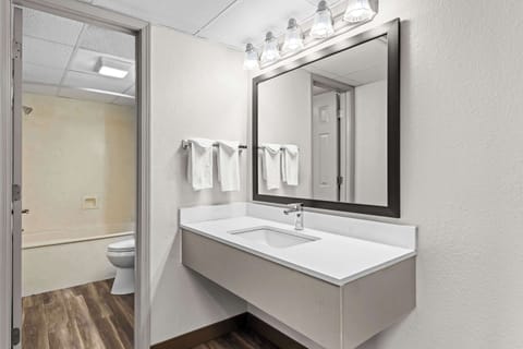 Suite, Non Smoking, Balcony | Bathroom | Hair dryer, towels