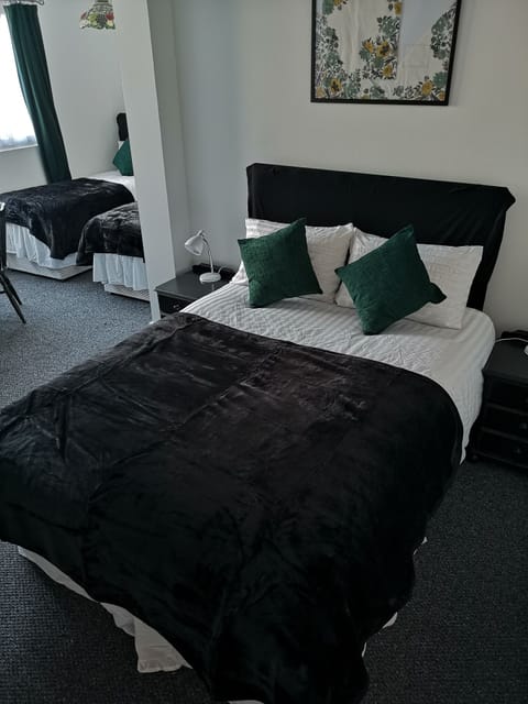 Family Room | Laptop workspace, blackout drapes, iron/ironing board, free WiFi