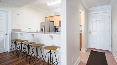 Breakfast bar connecting to kitchen