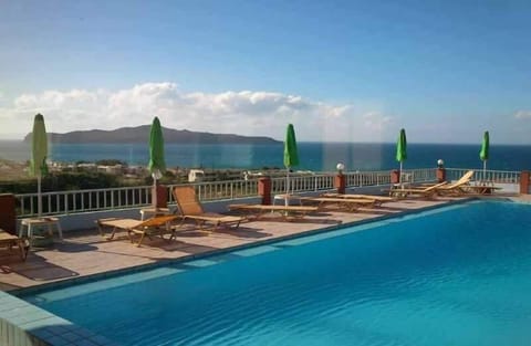 Indoor pool, open 10:00 AM to 8:00 PM, pool umbrellas, sun loungers