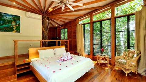 Superior Tree House, 1 King Bed, Garden View (Gumbo Limbo & Guanacaste) | Pillowtop beds, in-room safe, individually decorated