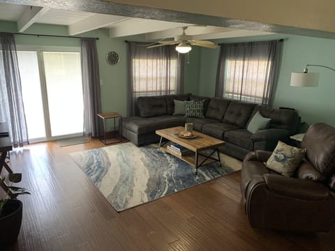 Comfy family room with a 70" smart tv.