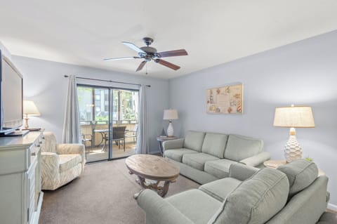 Settle into your comfortable living room with soft seating, gentle lighting, and a private balcony where you can enjoy fresh air and outdoor dining.