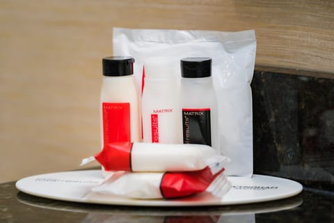 Eco-friendly toiletries, hair dryer, towels