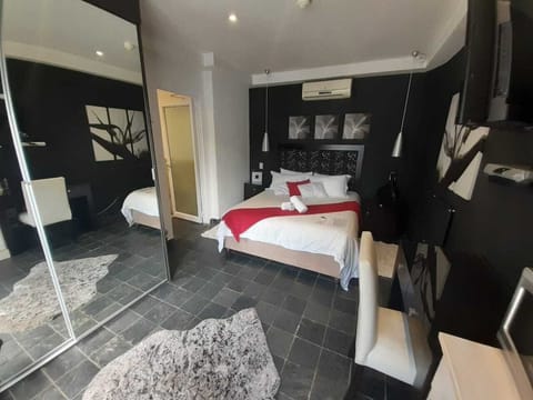 Deluxe Double Room (Self catering) | In-room safe, individually decorated, individually furnished, desk