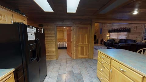View from the kitchen looking towards the living room and one of the bedrooms.