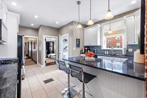 From Breakfast to Happy Hour – The island bar invites casual bites, drinks, or just keeping the chef company.