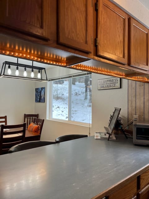 Countertop seats 4 barstools. Toaster oven.